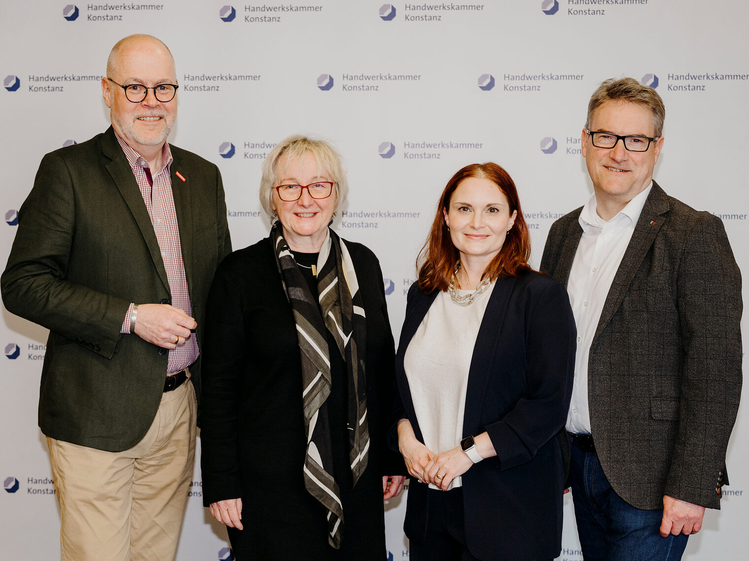 Gruppenbild mit Peter Haas, Theresia Bauer, Julia Kovar und Georg Hiltner.